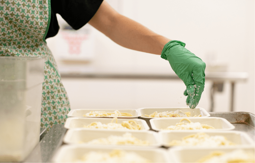 Rescued food being prepared in a kitchen